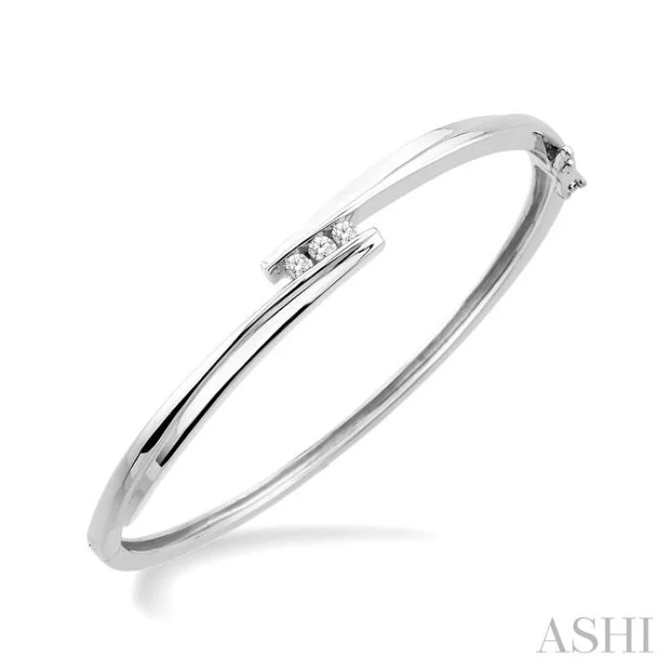 women’s matching bracelets-1/6 Ctw Round Cut Diamond Bangle in Sterling Silver