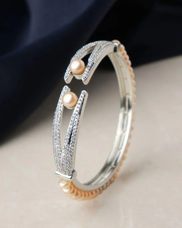 women’s charm bracelets-Delightful Stone Studded Pearl Bangle