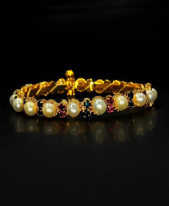 women’s gemstone bracelets-Stunning Stone Studded Pearl Bangle