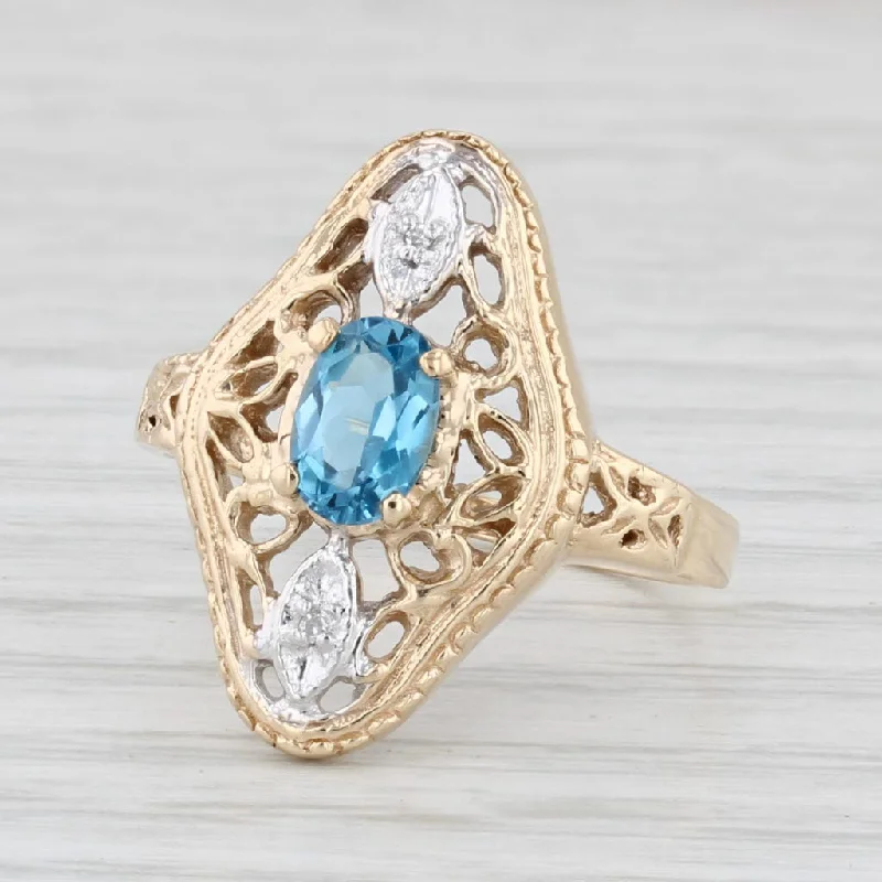 women’s custom engagement rings with diamonds-0.55ct Oval Blue Topaz Diamond Ring 10k Yellow Gold Size 6.5