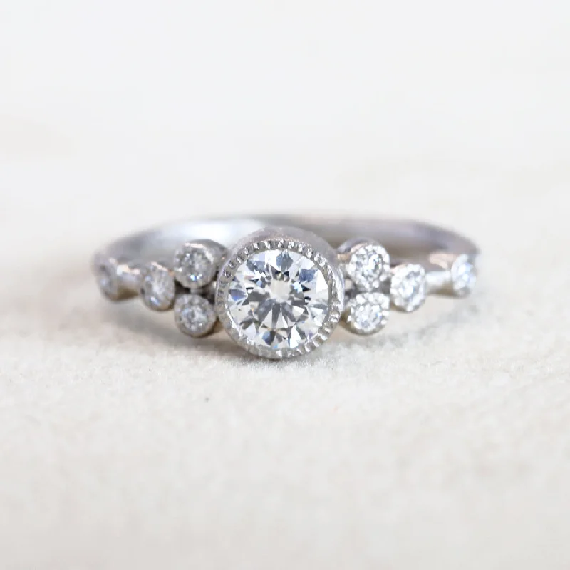 women’s unique engagement rings-9 bezel diamond ring