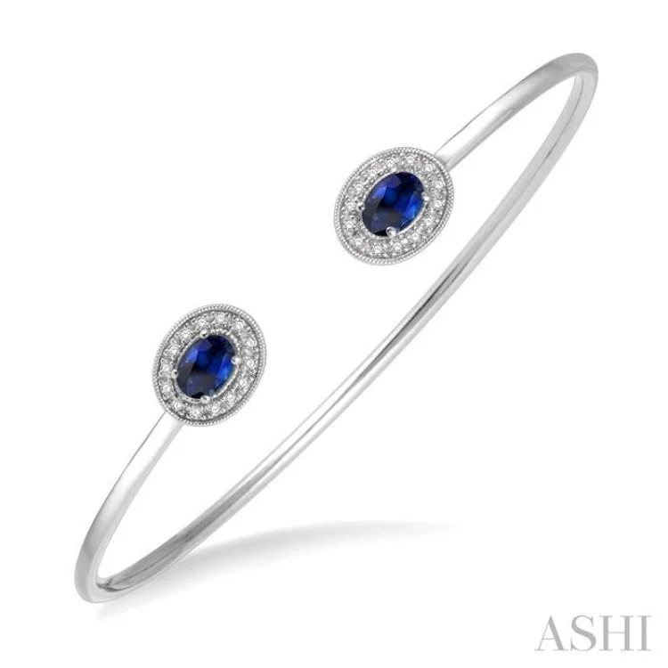 women’s delicate bracelets-1/5 Ctw Oval Cut 6x4mm Sapphire & Round Cut Diamond Precious Flexi Bangle in 14K White Gold