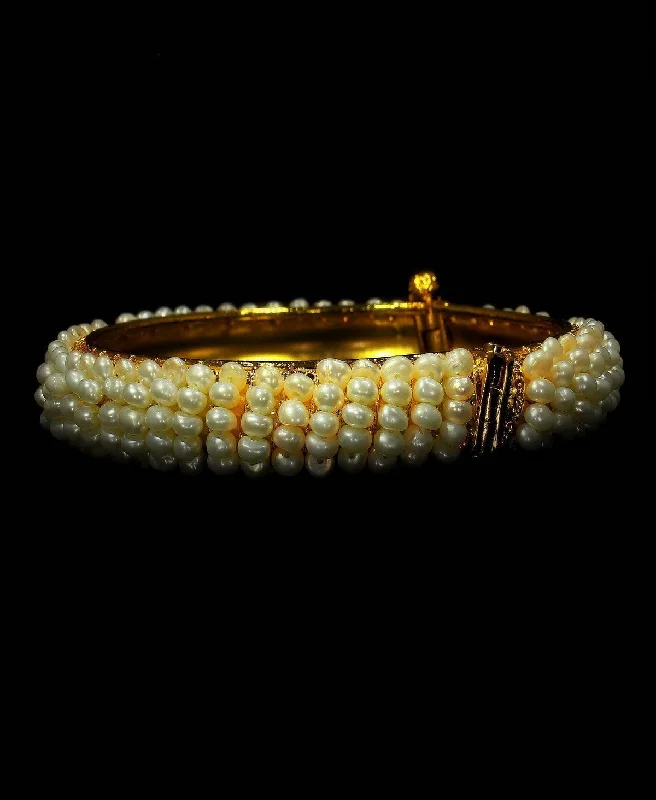 women’s precious stone bangles-Elegant and classy Pearl Bangle